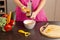 Woman grating fresh carrots