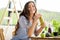 Woman with green healthy food and drinks at home