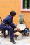 Woman grinding peanut in chinese new year