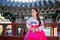 Woman with Hanbok in Gyeongbokgung,the traditional Korean dress.