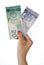 Woman hand with canadian dollar bills