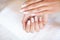 Woman Hand Care. Closeup Of Beautiful Female Hands Having Spa Manicure At Beauty Salon. Beautician Filing Clients