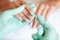 Woman Hand Care. Closeup Of Beautiful Female Hands Having Spa Manicure At Beauty Salon. Beautician Filing Clients
