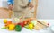 Woman hand cook make mix vegetables salad on kitchen for diet.