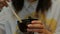 Woman hand eating miso soup with chopsticks,