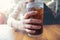 Woman hand giving glass ,Soft drinks with ice, sweethart or buddy