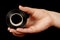 Woman hand holding black electric insulating tape