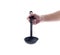 Woman hand holding black ladle dipper isolated