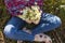 Woman hand holding daisies growing in the field