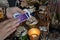 Woman hand is holding deck of tarot or oracle cards doing fortunetelling.