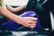 Woman hand holding a gear while driving. like a member.