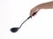 Woman hand holding ladle dipper isolated