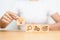 Woman hand holding lightbulb above dartboard, Gear and magnifying icon block. thinking, business planning process, goal, strategy