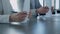 Woman hand holding papers closeup. Managers signing corporate deal with investor