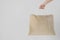 Woman hand holding sackcloth shopping bag with copy space No plastic bag concept