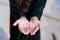 Woman hand holding variety of beautiful sea shells . Shells on the beach. Seashells in woman`s hand. Collecting empty shells,