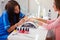 Woman hand on manicure treatment in beauty salon. Beauty parlour