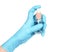 Woman hand in medical gloves holds antiseptic spray