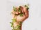 Woman hand, nature growth and fist for eco warrior, fight and revolution for sustainability protest. White background
