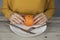 Woman  hand orange   on  plate