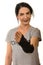 Woman with hand orthosis  stretch her palm