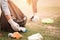 woman hand picking up garbage plastic for cleaning