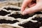 Woman hand planting seed in the ground or soil. spring sowing.