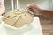 Woman hand potter making clay monstera leaf in pottery workshop studio. Process of creating ceramic vase. Handmade