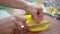 Woman hand prepares salad at home kitchen 4k close-up video. Female cooking side dish: cutting bell pepper with knife