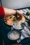 Woman hand putting some rice noodles in a bowl