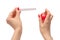 Woman hand with red nails with test strips for the perfume,  on a white background