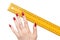 Woman hand with ruler