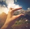 Woman Hand scaling mountain height from camping