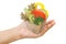 Woman hand serve vegetable salad cup