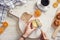 Woman hand spreading butter on sliced bread