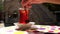 Woman hand stirring sugar with a spoon in a glass of Turkish tea in slow motion