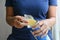 Woman hand taking chips potatoes