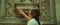 Woman hand touch ancient wall in cathedral church, historical architecture. Close-up of girl. Study of art.