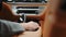 Woman hand touching automatic gear shift. Female driver using control knob