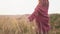 Woman hand touching field. Alone woman walks in harvest field. Loneliness in nature. slow motion. 3840x2160