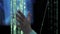 Woman hand touching LED garland light in dark room - close up follow shot