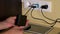 Woman hands attach micro usb cables to smart phones and tablet charging