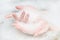 Woman hands in a bath with foam