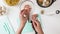 Woman hands chopping raw chicken breast fillet, close up accelerated video.