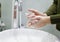 Woman hands closeup washing hands