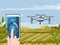 Woman hands controlling drone in agriculture field