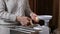 Woman hands cook and peel the onion with a knife. Girl peeling onions with a knife. Cook food