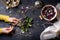 Woman hands cooking salad, fresh basil, radicchio leaves and eggs. Wooden table, directly above.