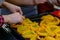 Woman hands cooking yellow pepper