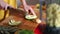 Woman hands cutting avocado before blending